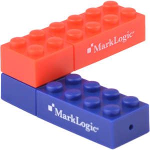A stackable brick flash drive in red and blue, featuring a logo on each piece.