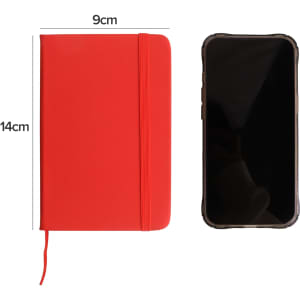 A red PU A6 notebook with a matching elastic band and a phone for size reference, featuring a logo.