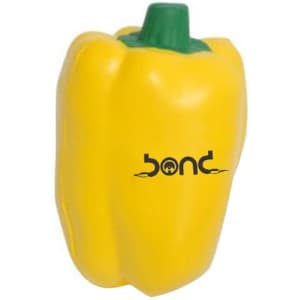 A yellow capsicum shaped stress reliever with a green stalk and a logo on the front.