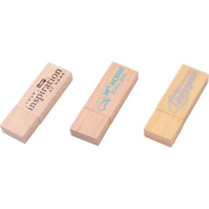 Three rectangular wooden flash drives in light wood tones, featuring varying designs and a branding logo on one.