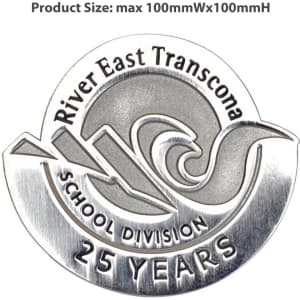 A silver die struck lapel pin featuring a wave design and text indicating "25 Years". It includes a logo and is circular.