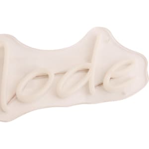 A white neon LED sign with a smooth, curved shape, featuring the word “lode”. The sign has a transparent backing.