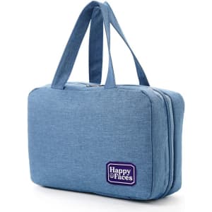A large blue hanging toiletry bag with two handles and a branded logo.