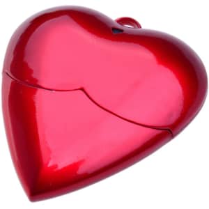 A red heart-shaped USB flash drive with a glossy finish and a small attachment loop. It features a logo.