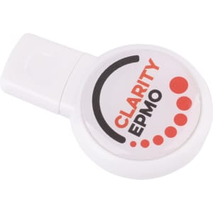 A round, white domed flash drive featuring a logo and red accents on the front.
