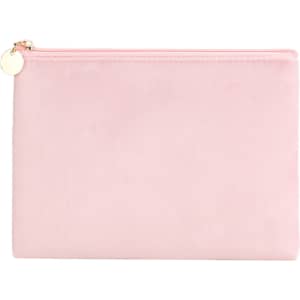 A durable flat makeup bag in a soft pink shade with a gold zip and a small charm.