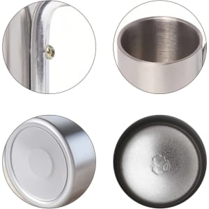 A stainless steel double-walled mug with a carabiner handle, featuring a shiny silver finish and a black base.