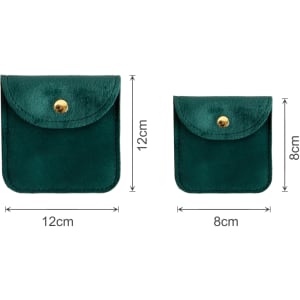 A square velvet jewelry pouch in a deep green colour, featuring a snap button closure, available in two sizes.