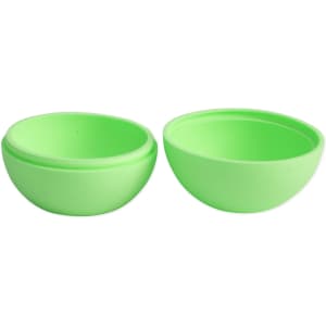 A pair of bright green silicone moulds for creating whisky ice balls, featuring a smooth finish and rounded shape.