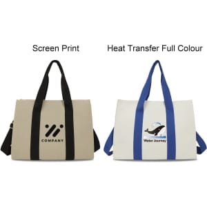 Two canvas grocery shopping bags in beige and white. One features a black logo, and the other has blue straps with a printed design.