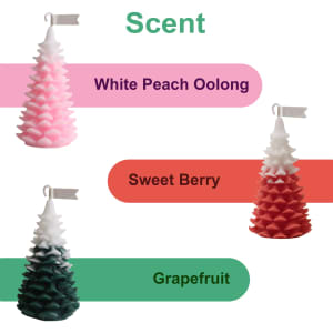 Cedar Christmas tree-shaped candles in pink, red, and green, each labelled with different scents.