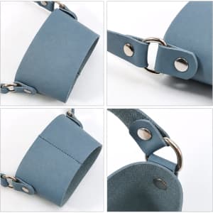 A drink bottle holder made of blue leather with silver metal hardware and adjustable straps.