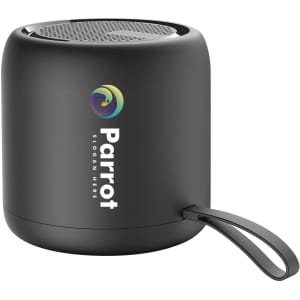A portable waterproof Bluetooth speaker in black, featuring a logo and a carrying strap.