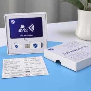 An RFID Promo Set featuring a blue RFID blocking card, USB data blocker, and webcam cover, all in a white box with logos.