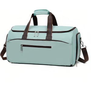 A teal convertible backpack duffel garment bag with brown handles and zippers. Features multiple compartments.