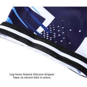 A close-up of black and blue Men's Sublimated Cycling Bib Shorts, highlighting the silicone gripper tape at the hem.