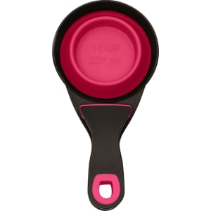 A collapsible pet food scoop in black and pink, featuring a one-cup measurement with a handle.
