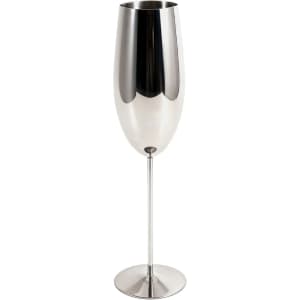 A stainless steel champagne flute with a sleek, reflective finish and a long stem on a circular base.