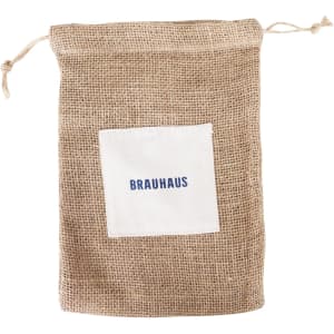A jute net produce bag in brown, featuring a white patch with a logo. The bag has a drawstring closure.