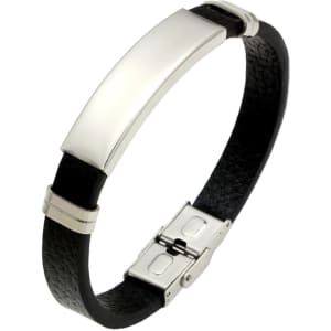 A custom leather bracelet featuring a black band and a silver-tone metal plate with a clasp fastening.