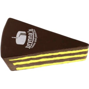 A chocolate cake shaped stress reliever in brown and yellow, featuring a logo on its surface.