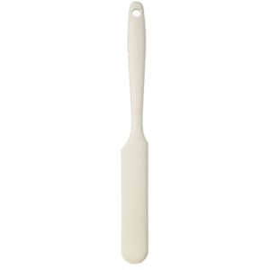 A white silicone spatula with a long handle and a rounded edge, featuring a hole for hanging.