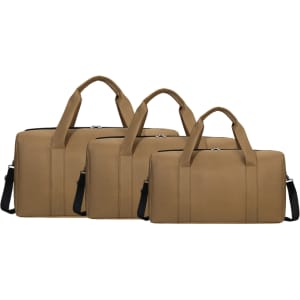 Three tan durable duffle bags of varying sizes, each with handles and an adjustable strap. Each bag has a logo.