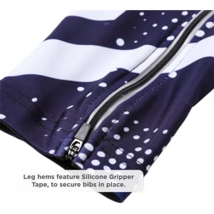 Men's sublimated cycling bib tights in navy blue and white with zip detail and silicone gripper tape at leg hems.