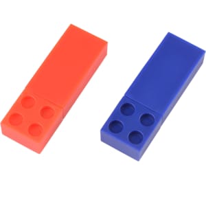A stackable brick flash drive in orange and blue, featuring a playful design and embedded logo.