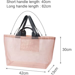 A large mesh beach tote bag in a soft pink colour with black handles, featuring both short and long handle options.
