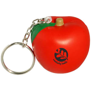 A red apple stress reliever keyring with a green leaf and a silver keychain. It features a logo on one side.