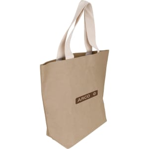 A large, beige washable Kraft paper bag with cotton handles and a logo.