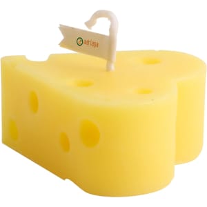A yellow heart-shaped candle designed to resemble cheese, complete with a wick and a small tag.