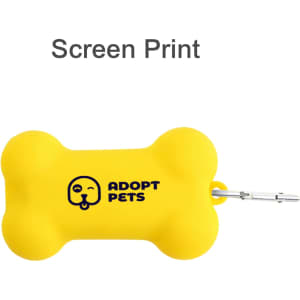 A yellow silicone bone-shaped dog poop bag dispenser with a logo.