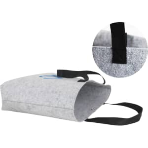 A grey felt shopping bag with black handles, featuring a circular inset showing a detail of the handle.