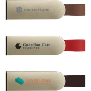 A sliding metal flash drive with a beige body and a brown or red plastic pull tab, featuring various logos.