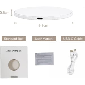 A round white wireless charger with a USB-C port, accompanied by a user manual and USB-C cable.