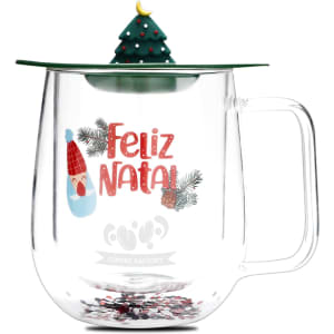 A transparent double wall mug with a green lid topped by a festive Christmas tree design, featuring Christmas-themed text and decorations.