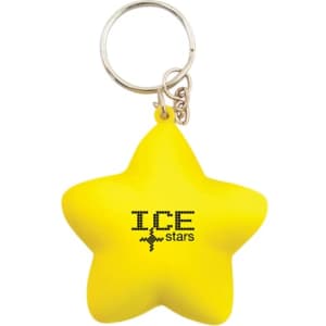 A yellow star-shaped stress reliever attached to a keyring, featuring a logo.