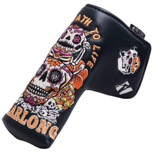 A black custom blade putter cover featuring colourful skull designs and intricate floral patterns, with branding details.