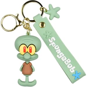 A green custom-shaped PVC keyring featuring a cartoon character with a matching strap and a logo.