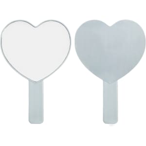 A heart-shaped handheld mirror with a shiny silver handle, reflecting a clear image on one side and a flat back on the other.