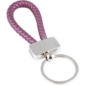A metal keyring tag with a braided purple strap and a circular metal ring attachment. It includes a logo.