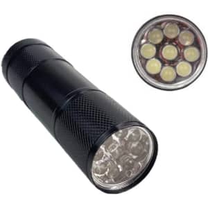 A black portable LED torch with multiple light bulbs on the front, featuring a textured grip and circular end.