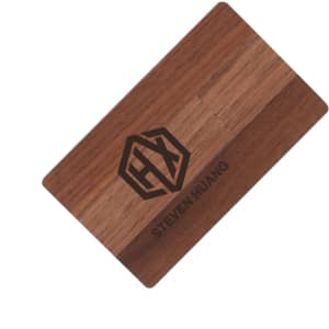 A wooden flash drive in brown tones featuring a logo on one side.