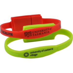 Two silicone wristbands, one red with black text and one bright green with black text, featuring logos.