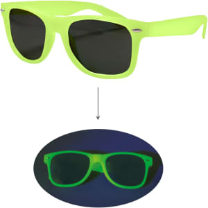 Glow in the dark sunglasses in vibrant neon green with dark lenses, displayed under both normal and UV light.