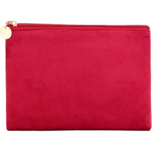 A red durable flat makeup bag with a zip closure and a gold accent. It has a smooth, textured finish.