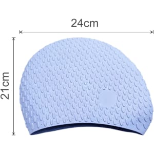 A silicone swimming cap in light blue, featuring a textured surface with water droplet patterns and a brand logo.