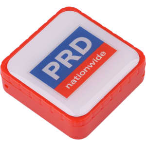A square flash drive in red and white, featuring a logo on its front.
